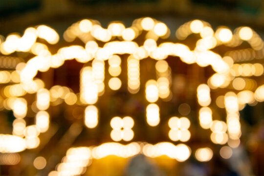 Out of Focus Carousel Lights in Amusement Park