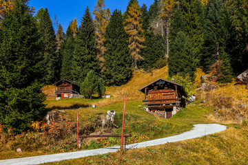 Scenic view of a small wooden cabin in the Dolomites mountains, Italy, Europe
