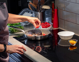 Cooking and preparing a savoury protein breakfast scramble.
