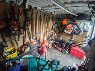 Panel van loaded with gardening equipment © WH_Pics