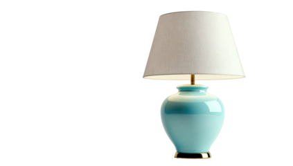 A softly illuminated, classic table lamp with a light blue ceramic base and a white lampshade on a black background
