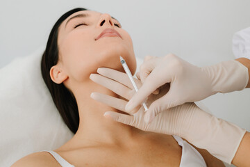 Cosmetic procedure using botulinum toxin to enhance chin and jawline balance. Botulinum toxin chin...