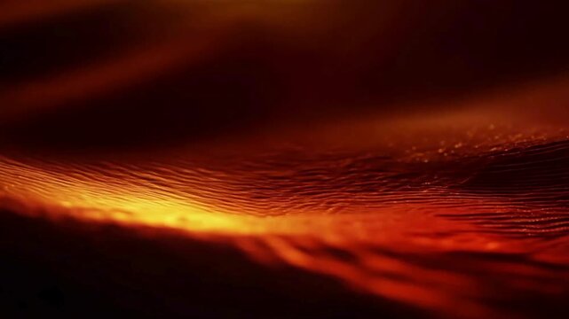 Cinematic, close-up abstract motion background of deep red and orange flowing textures, resembling desert dunes or liquid silk, with golden glitter sparkling on the crests.