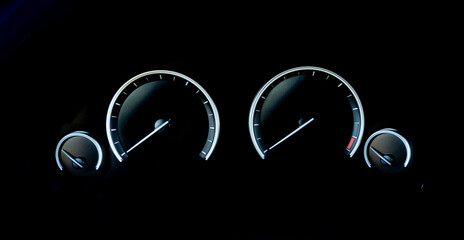 Minimalistic view of Sports car dashboard instruments on black background