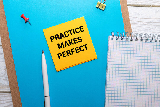 practice makes perfect - a motivational slogan on a green stocky note.