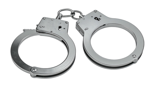 Close-up of silver metal handcuffs with a chain connection, isolated on a black background