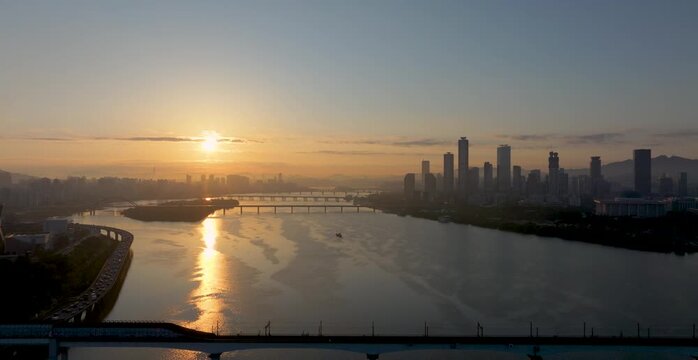 An aerial view of Seoul's Hangang River, Yeouido, and Seonyudo Park in autumn