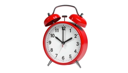 Shiny red twin-bell alarm clock against a stark black background shows the time at ten o'clock