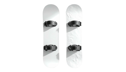 Two white snowskates with black bindings sit against a black background with shadows and varying texture