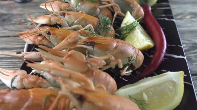 boiled crayfish on wooden background