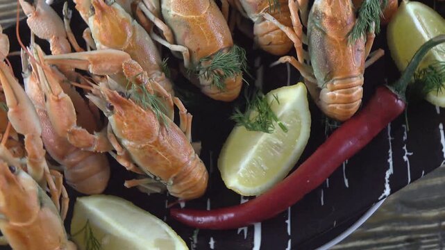 boiled crayfish on wooden background
