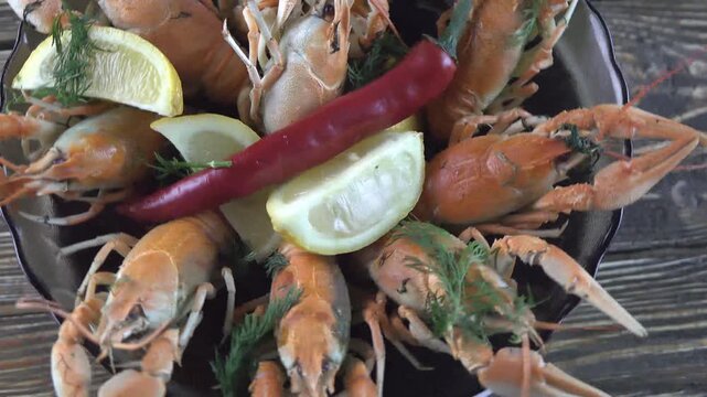 boiled crayfish on wooden background