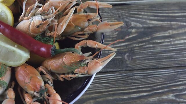 boiled crayfish on wooden background