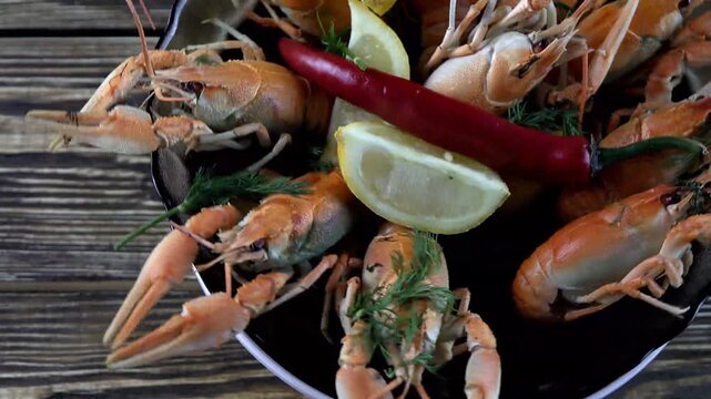 boiled crayfish on wooden background