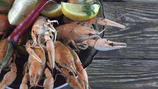 boiled crayfish on wooden background