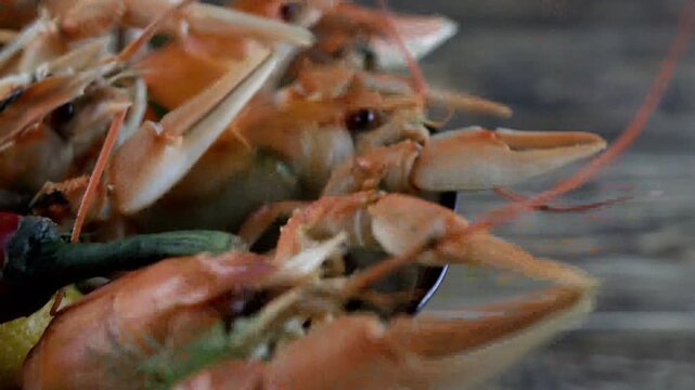 boiled crayfish on wooden background