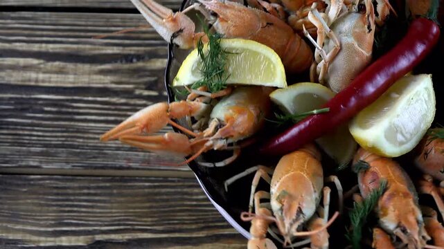 boiled crayfish on wooden background