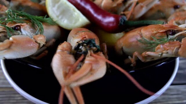 boiled crayfish on wooden background