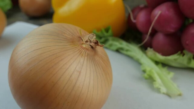 fresh onions on a wooden background