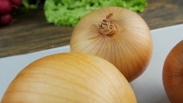 fresh onions on a wooden background