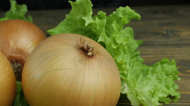 fresh onions on a wooden background