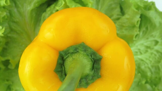 lettuce and sweet bell pepper on a rotating backgr