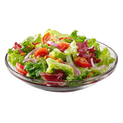 Fresh salad leafy greens, sliced tomatoes, red onion, and bits of corn, in glass bowl on a black background