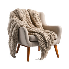 Cream armchair with wooden legs and a beige knitted blanket draped over it, isolated on black