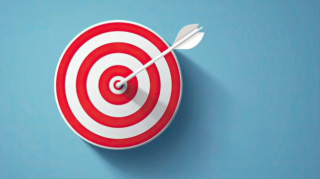 Red and white target with arrow centered