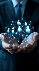 Close up of a businessman s hands holding a glowing digital network of people icons representing global connection and teamwork in a modern business concept