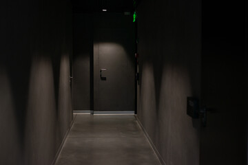 modern dark office hallway with doors