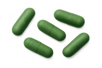 Green herbal capsules displaying natural medicine, dietary supplement, wellness, and healthy lifestyle on transparent background