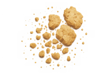 Broken cookie pieces and delicious crumbs scattered, sweet snack with transparent background