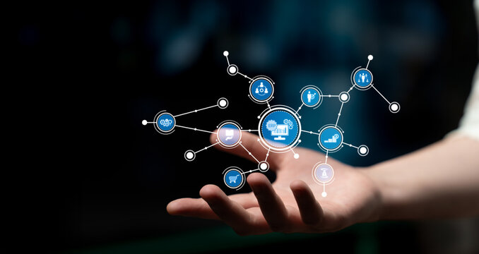 A close-up of a hand showcasing glowing digital icons that represent different sectors, symbolizing the integration of technology and innovation in modern life. Tessel