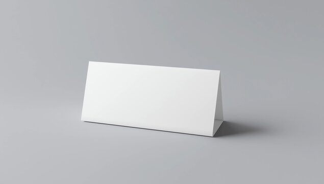 Blank table tent card mockup with copy space isolated on grey background