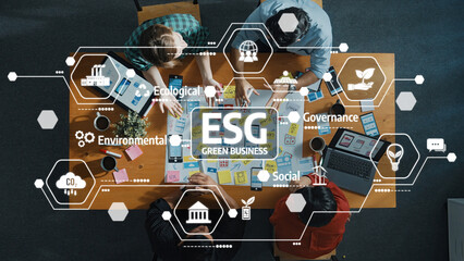 Teams collaborate on innovative strategies for green business practices, focusing on ESG principles...