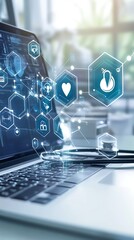 Laptop with Medical Icons Overlay and Stethoscope, Healthcare Technology and Innovation Concept