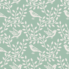 Seamless birds and branches vector pattern