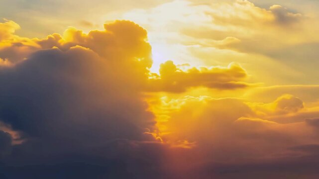 Dramatic slow motion of golden, glowing clouds at sunset or sunrise with bright sun rays. Ideal for heavenly, spiritual, dream, travel, and environmental concepts.