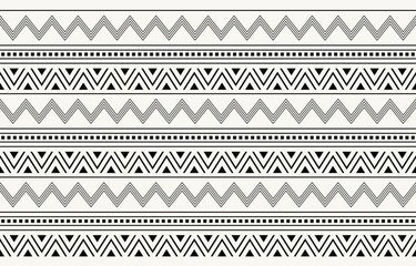 Ethnic tribal  black and white bohemian zigzag stripe background. Seamless tribal pattern, folk embroidery,  geometric  ornament. Traditional design for fabric, textile,  rug,  carpet


