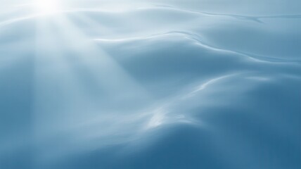 Obraz premium Abstract soft blue and white gradient background with subtle textures and light reflections
