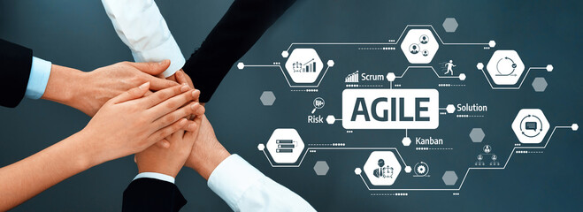 A group of diverse hands coming together symbolizes collaboration in an agile environment,...