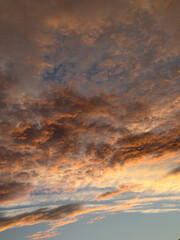 Golden Sunset Sky with Dramatic Clouds over the Horizon. Sydney, NSW, Australia.