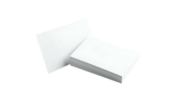Stack of blank rectangular white cards leaning against a single upright card on black backdrop