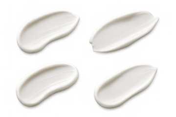 White cosmetic cream smears creating smooth textures for beauty and skincare advertising isolated on a transparent background