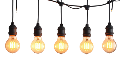 Five warm-glowing light bulbs hang from a black cable against a dark background, illuminating the scene