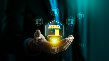 Franchise business model with businessman hand holding retail store icon, network expansion, brand growth, partnership opportunity, small business development, marketing strategy, franchise success