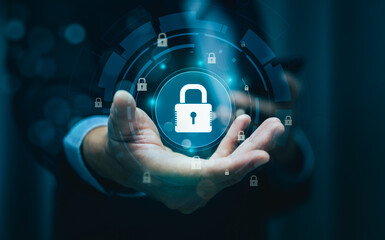 Businessman holding digital padlock icon in hand, representing cybersecurity, data protection, online privacy, secure access, internet technology concept for safety, encryption, information security.
