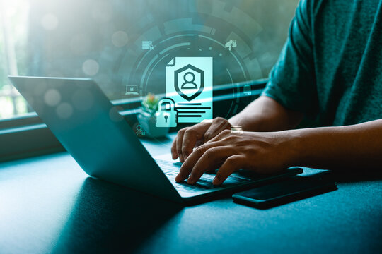 Cybersecurity, data privacy protection on laptop computer with digital shield icon, secure online identity, encrypted information, compliance policy, confidential document security technology concept