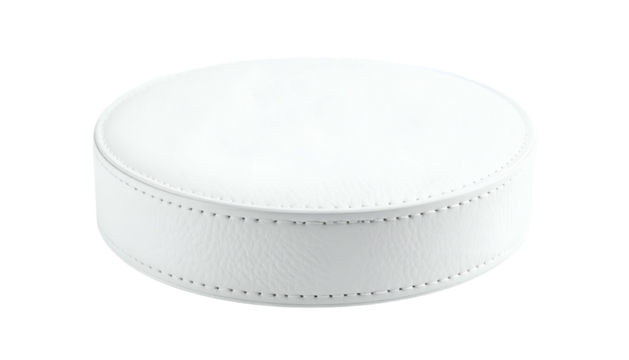 A circular, white, cushioned ottoman or seat with visible stitching detail around its circumference